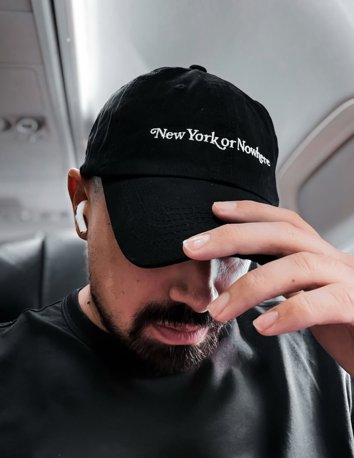 New York or Nowhere cap on a plane